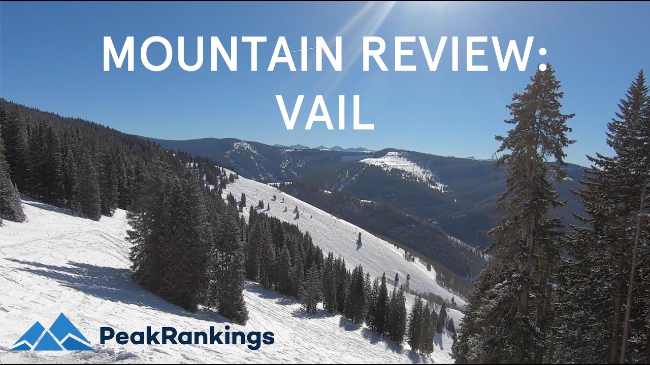 A snowy mountain landscape with evergreen trees under a clear blue sky. Text reads: "Mountain Review: Vail." Logo in the corner says "PeakRankings.