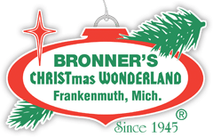 10 Dazzling Christmas Light Shows in Michigan You Can’t Miss in 2025 (Plus Free Spots & Secret Local Favorites!) 5 Logo for Bronner’s Christmas Wonderland in Frankenmuth, Michigan, featuring a red ornament shape, green pine branches, and green text.