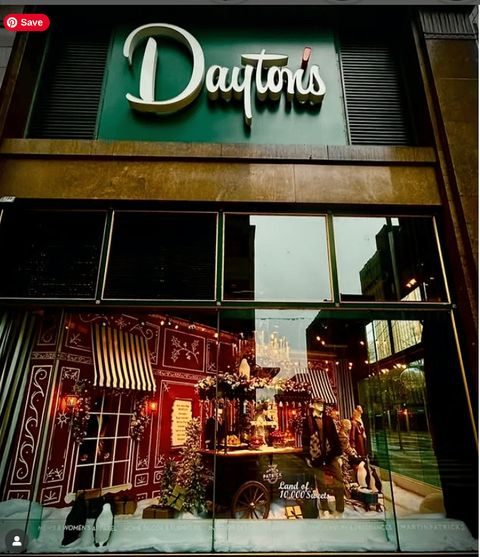 Minnesota’s 50 Best Christmas Markets to Visit in 2025 (You’ll Love #7!) 2 Dayton's storefront with large sign above and festive window display, featuring a holiday scene labeled "Land of 1,000 Sweets.
