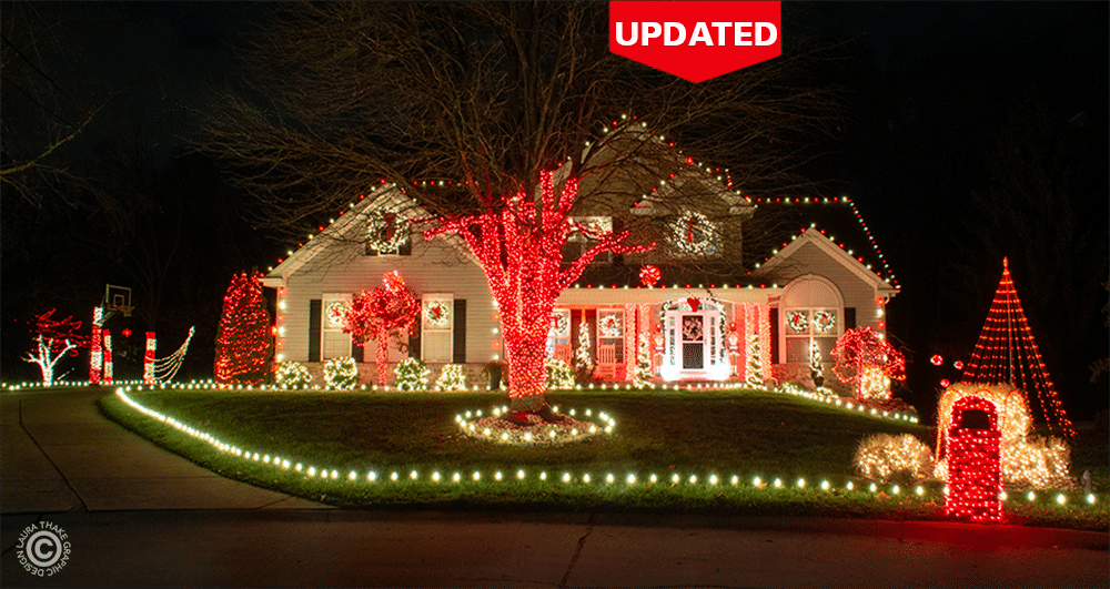 20 Magical Christmas Light Displays in Missouri You Can’t Miss This Holiday Season! (#6 is Jaw-Dropping) 4 A house decorated with bright red and white Christmas lights, including illuminated trees, bushes, and mailbox, at night. A red "UPDATED" label is at the top right.
