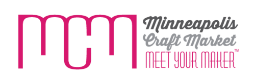 Minnesota’s 50 Best Christmas Markets to Visit in 2025 (You’ll Love #7!) 7 Logo for Minneapolis Craft Market with the initials "MCM" in pink and the phrases "Minneapolis Craft Market" and "Meet Your Maker" in stylized text.