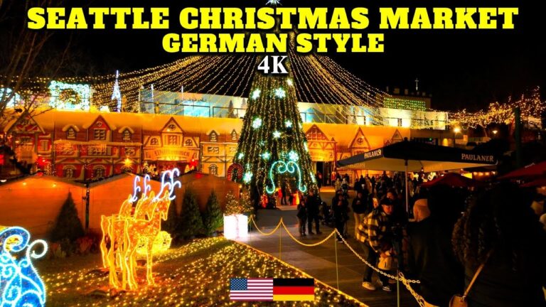 Seattle Christmas Market decorated with lights and a large Christmas tree, featuring a German-style village scene and people walking around.