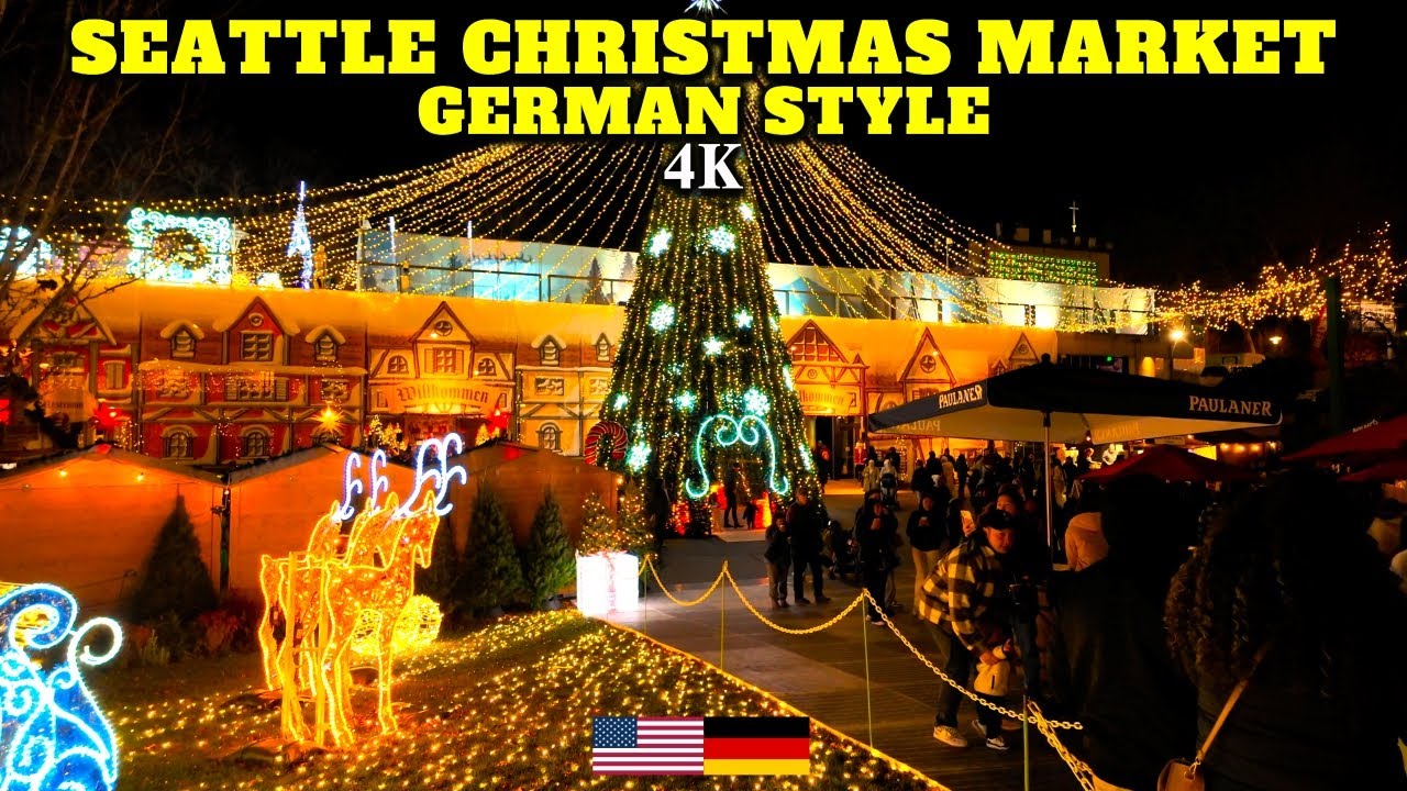 Christmas Markets Washington State 2025: Top 50 Festive Events and Holiday Fairs 1 Seattle Christmas Market decorated with lights and a large Christmas tree, featuring a German-style village scene and people walking around.