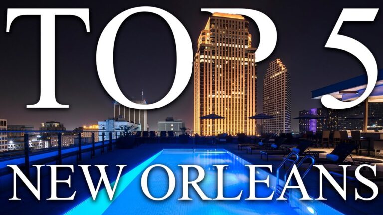 Rooftop pool overlooking downtown New Orleans at night with large text reading "Top 5 New Orleans.